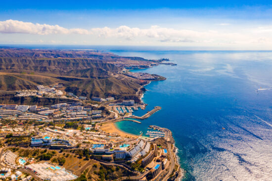Aerial view over Puerto Rico and Southern Gran Canaria Coastline