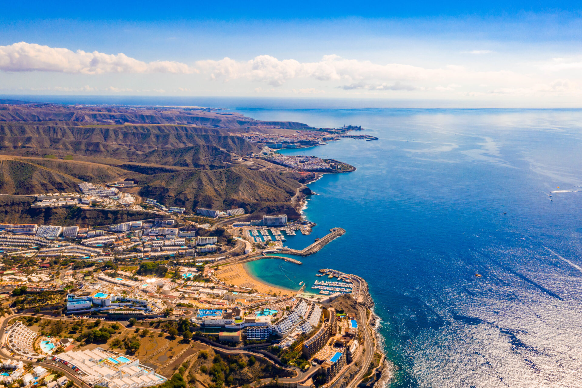 Aerial view over Puerto Rico and Southern Gran Canaria Coastline